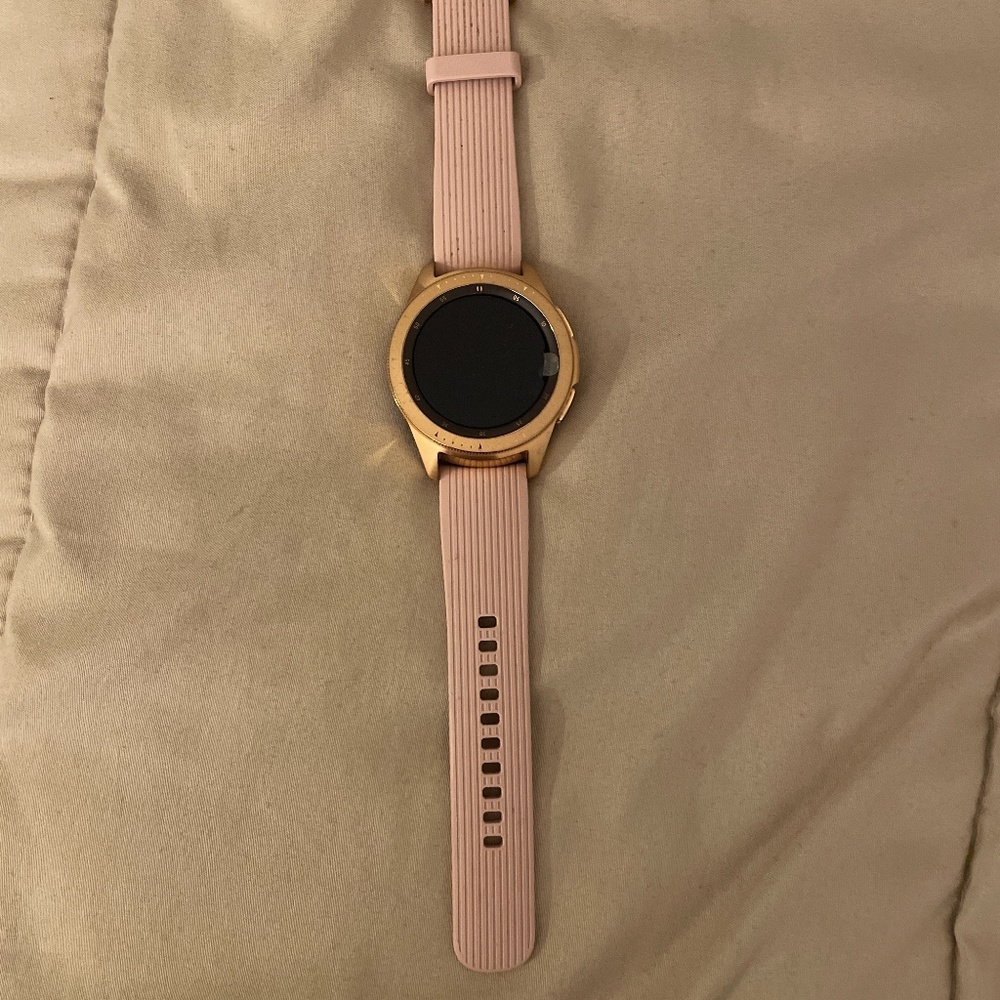 Pink Samsung Galaxy smart watch